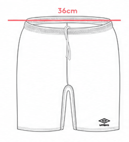 Soccer shorts laid flat, showing where the half waist is measured